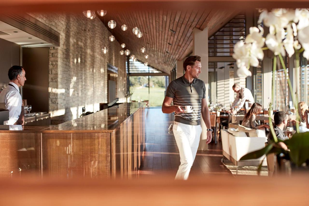 Minthis Resort Tsadha Bagian luar foto Restaurant