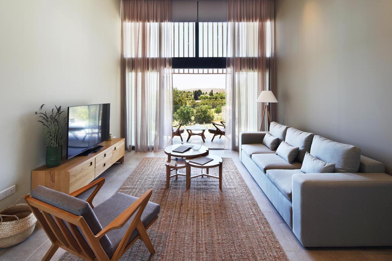 Minthis Resort Tsadha Bagian luar foto Living room