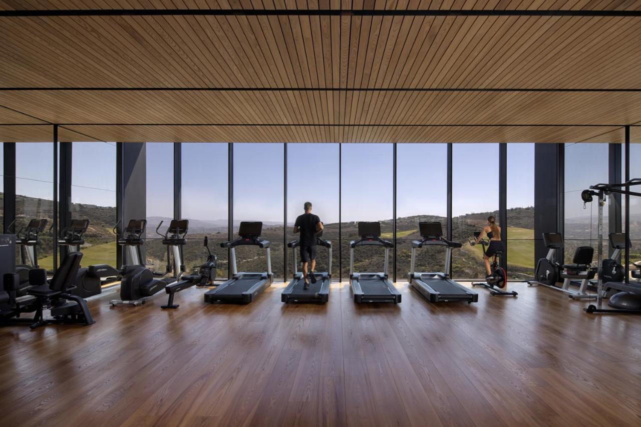 Minthis Resort Tsadha Bagian luar foto The gym at the hotel