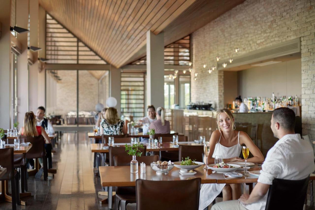 Minthis Resort Tsadha Bagian luar foto The restaurant
