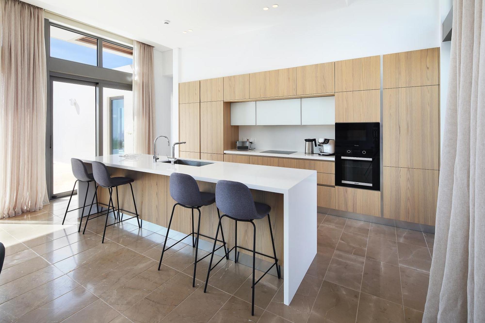 Minthis Resort Tsadha Bagian luar foto A kitchen