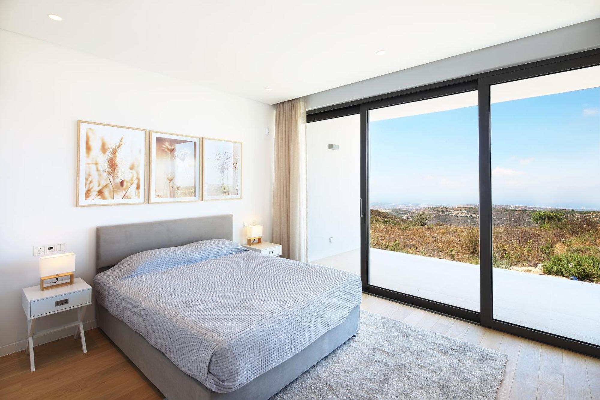 Minthis Resort Tsadha Bagian luar foto Bedroom with sliding doors